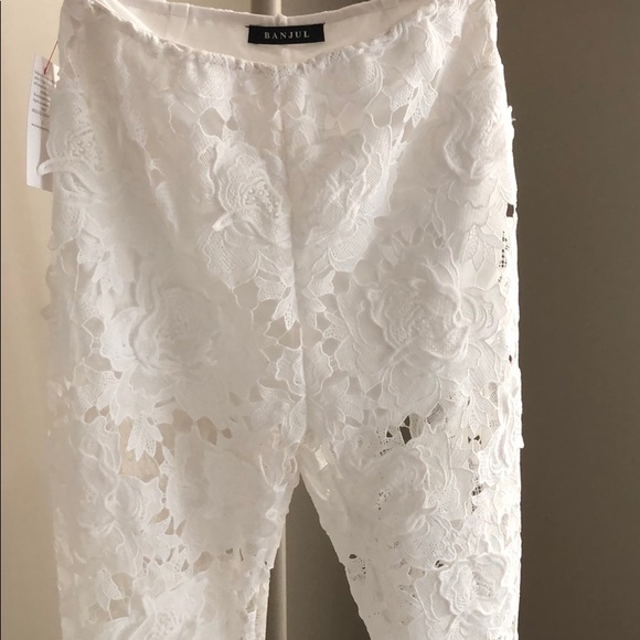 Banjul two piece white floral suit. - Picture 3 of 4